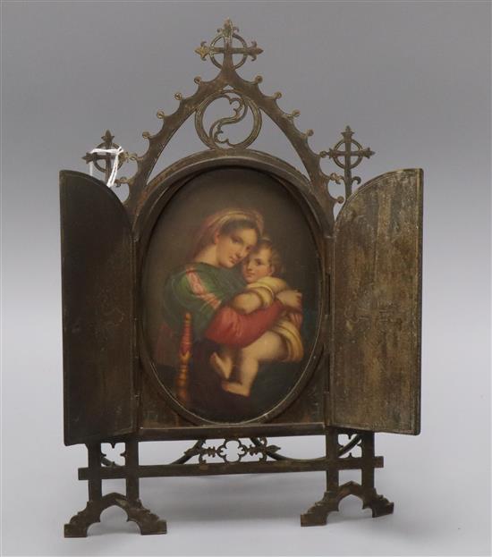 A late 19th century German porcelain plaque decorated with the Madonna & child, ormolu casement frame H.29cm.